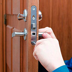 Opening a wooden door