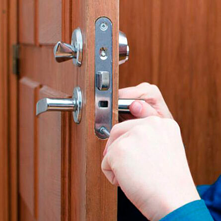Opening a wooden door