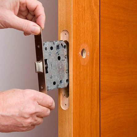 Replacing a lock on a wooden or aluminum door